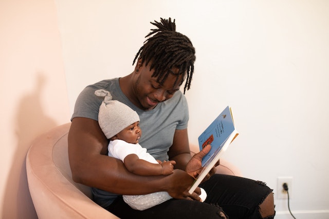 Reading to your baby can help build attention muscles, strengthen your parent-baby bond, and also develop the brain by KC Umeh.